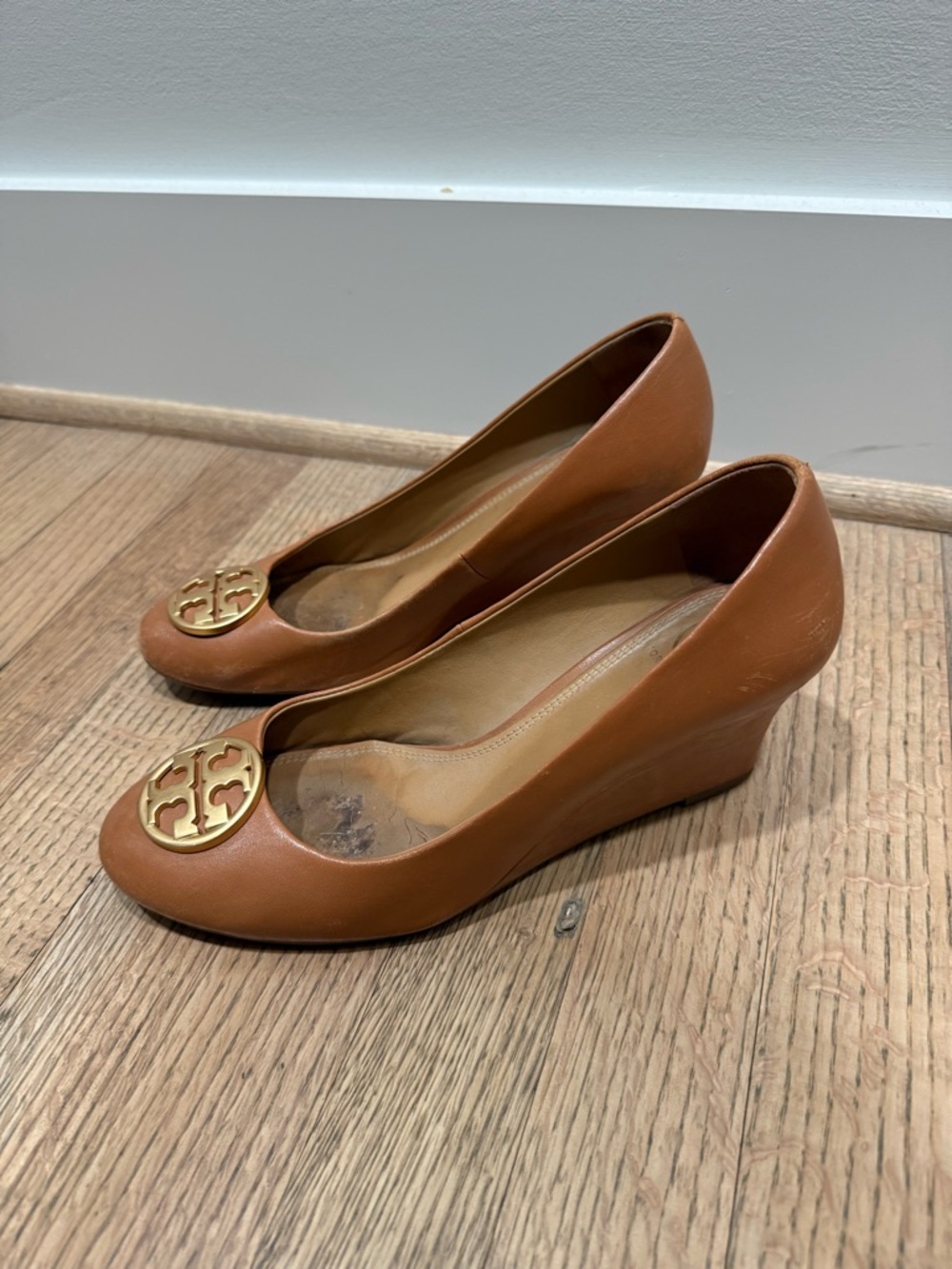 Tory Burch Cognac Leather Wedge Pumps with Gold Logo Medallion